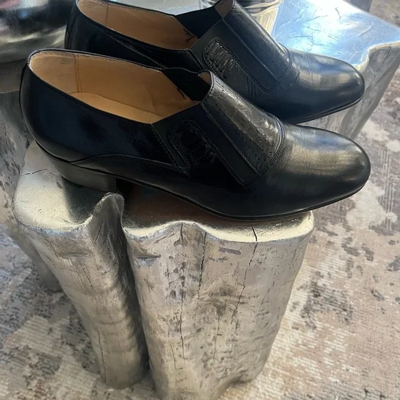 Travolta shoes 2025